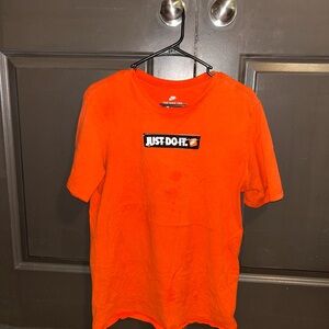 Nike Vibrant Orange Tee with Iconic Slogan